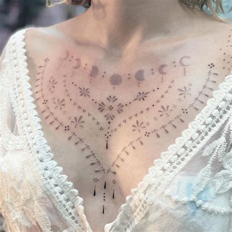 between chest tattoo female|50 Striking Chest Tattoo Designs for Women